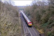 A pair of class 66s with 16 coaches at Shrewley.
